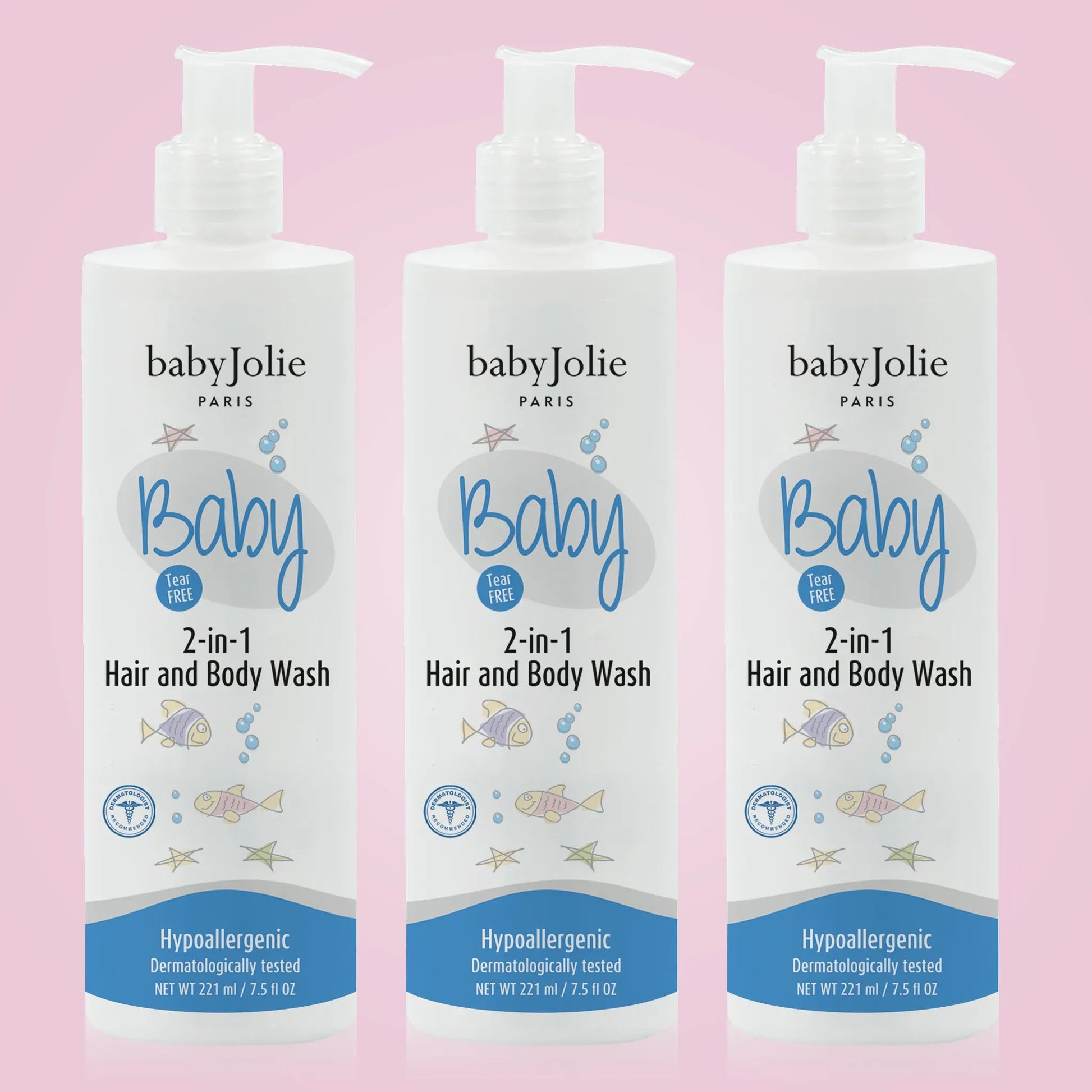 Three white pump bottles of Baby Jolie 2-in-1 tear-free hair and body wash, 7.5oz each, against a soft pink background.