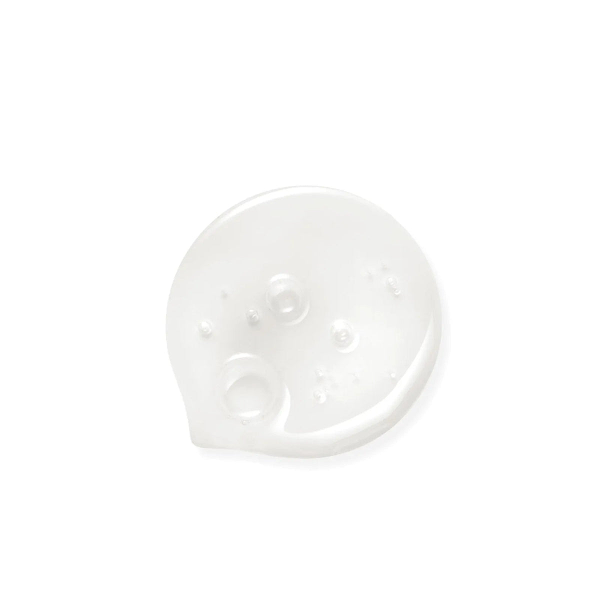Clear, viscous drop of Baby Jolie 2-in-1 hair and body wash with small air bubbles on a clean white background.