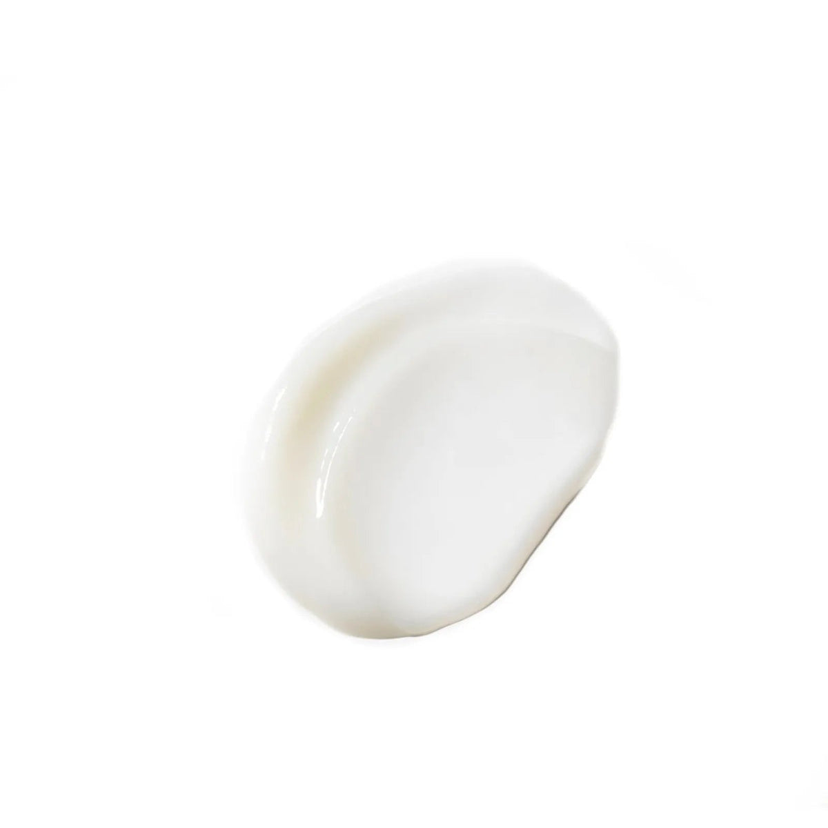 A smooth, creamy dollop of white Baby Jolie hair conditioner isolated on a clean white background.