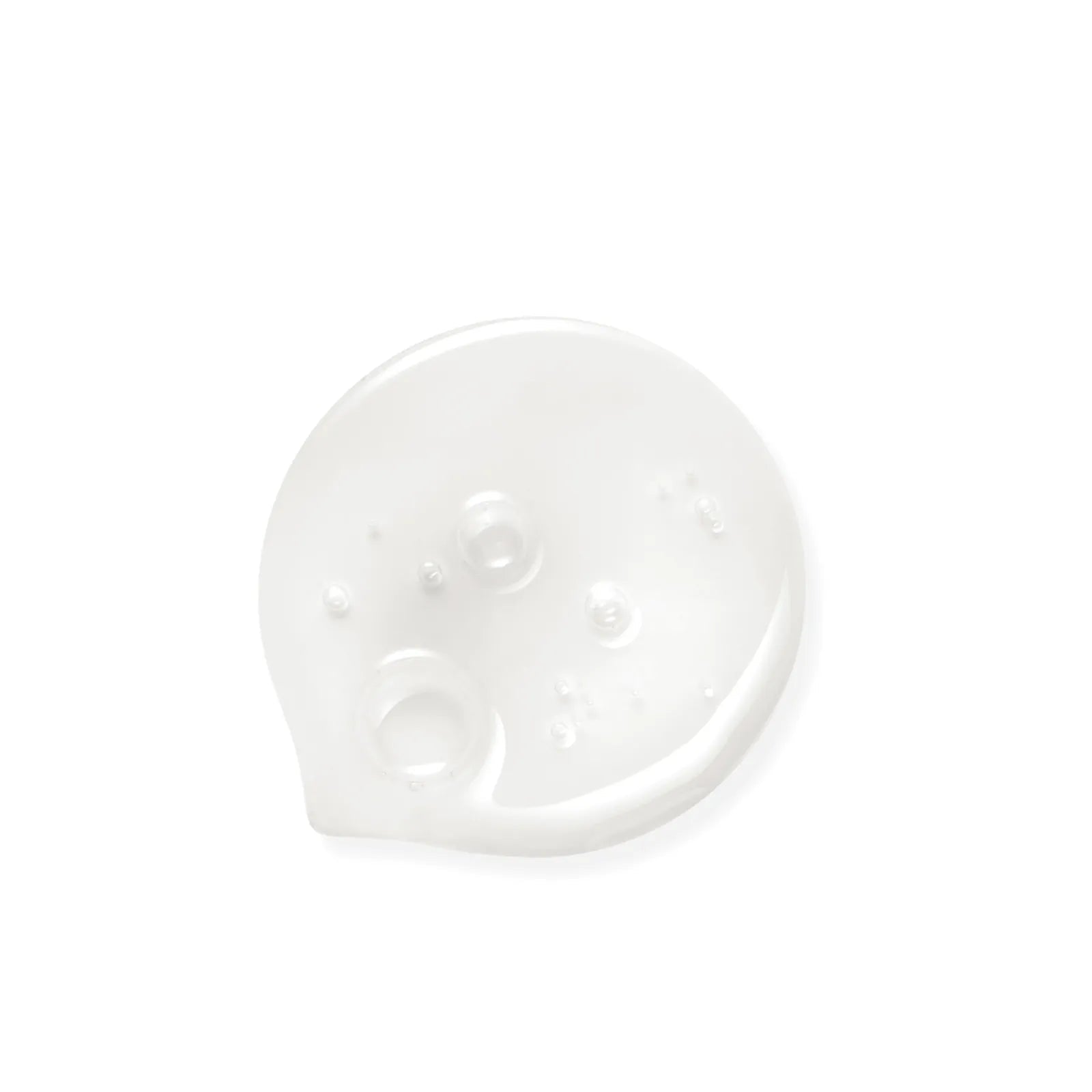 Clear, viscous drop of Baby Jolie tear-free shampoo with small air bubbles on a clean white background.