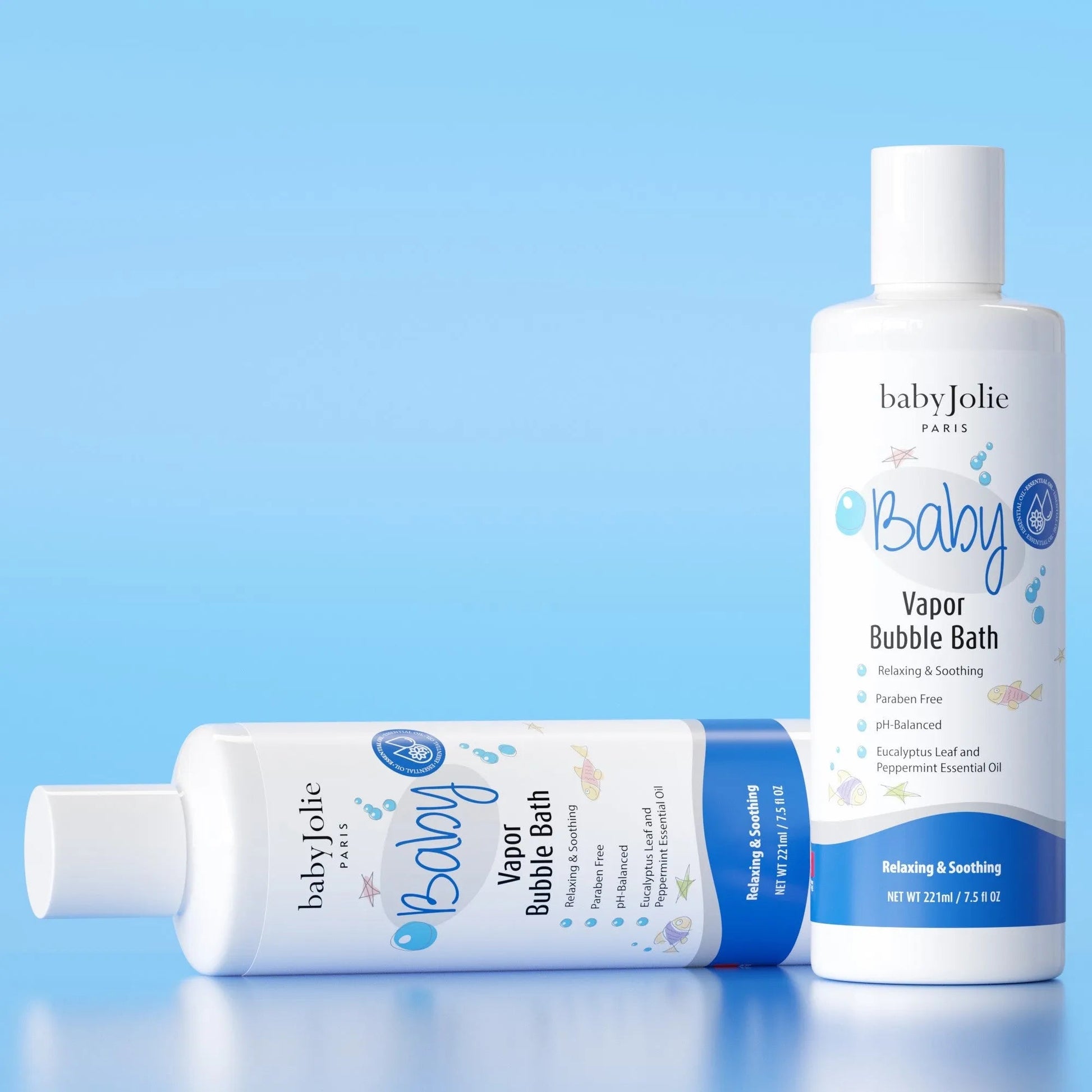 Two white 7.5 oz Baby Jolie Vapor Bubble Bath bottles with blue labels and whimsical fish illustrations on a blue background.